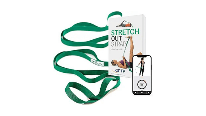 The Original Stretch Out Strap by OPTP with its accompanying exercise guide book and a smartphone displaying the instructional app. This green multi-loop strap is a key tool in the Align Athlete recovery system for improving flexibility and relieving back tension.